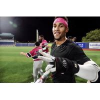 Victor Victor Mesa and the Pensacola Blue Wahoos celebrate a walk-off win