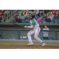 Willie Abreu of the Kansas City Monarchs drives in one of his three RBI on the night