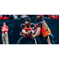 B.C. Lions quarterback Nathan Rourke and fullback David Mackie