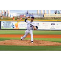 Luis Castillo pitching for the Pensacola Blue Wahoos in 2017