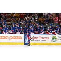 Kitchener Rangers offer congratulations along the bench to Mitchell Martin