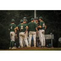 Sanford Mainers meeting on the mound