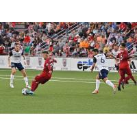 Chattanooga Red Wolves midfielder Moe Espinoza with possession