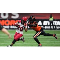 Calgary Stampeders running back Peyton Logan runs vs. the B.C. Lions