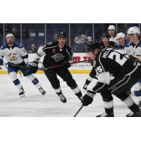 Ontario Reign forward Nikita Pavlychev (center)