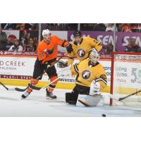 Lehigh Valley Phantoms' Tyson Foerster And Wilkes-Barre/scranton Penguins' Goalie Dustin Tokarski In Action