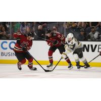 Tucson Roadrunners' Laurent Dauphin and Nathan Smith versus Henderson Silver Knights' Jonas Rondbjerg