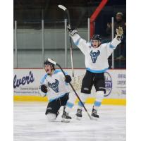 Cashen Naeve (#23) celebrates with Wisconsin Windigo teammate Sam Jacobs (back)