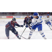 Wichita Thunder forward Jay Dickman (right) vs. the Tulsa Oilers