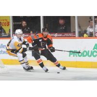 Wilkes-Barre/scranton Penguins' Valtteri Puustinen Battles Lehigh Valley Phantoms' Max Willman