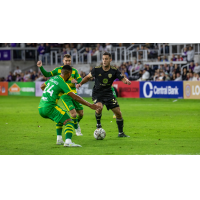 Louisville City FC midfielder Paolo DelPiccolo with possession vs. the Tampa Bay Rowdies