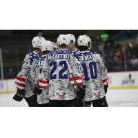 Tucson Roadrunners' Ben McCartney, Jean-Sebastien Dea and Michael Carcone on the ice