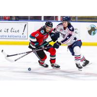 Kelowna Rockets right wing Marcus Pacheco (left) vs. the Tri-City Americans