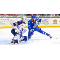 Tulsa Oilers' Colten Ellis and Wichita Thunder's Stefan Fournier on the ice