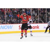 Calgary Hitmen forward London Hoilett celebrates 2022 ENMAX Teddy Bear Toss Goal