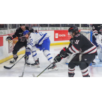 Wichita Thunder forward Jay Dickman battles the Rapid City Rush