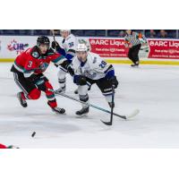 Kelowna Rockets defenceman Ismail Abougouche (left) vs. the Victoria Royals