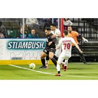 St. Louis Ambush forward Duduca Carvalho eyes the ball against the Baltimore Blast