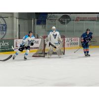 Wisconsin Windigo goaltender Gavin Moffat and Paul Huglen defend the net