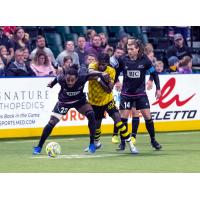 St. Louis Ambush's Marcel Berry And William Eskay Versus Alex Bradley Of The Milwaukee Wave