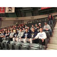 Lacrosse players from Queens University watch the Charlotte Bootleggers