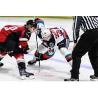 Kelowna Rockets centre Dylan Wightman (right)