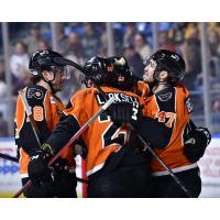 Lehigh Valley Phantoms' Jackson Cates, Olle Lyckselland and Louie Belpedio celebrate win