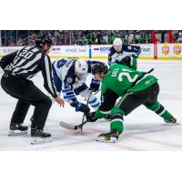 Texas Stars center Oskar Back faces off with the Manitoba Moose