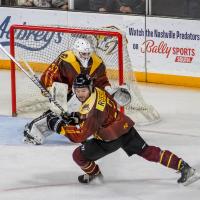 Knoxville Ice Bears' Rourke Russell And Goalie Kristian Stead In Action