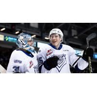 Victoria Royals' Braden Holt and Reggie Newman celebrate win