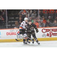 Lehigh Valley Phantoms' Isaac Ratcliffe and Hershey Bears' Riley Sutter in action