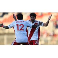 Loudoun United FC celebrates a goal