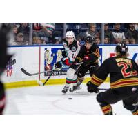 Kelowna Rockets left wing Carson Golder battles the Vancouver Giants