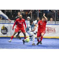 Kansas City Comets' Ray Lee And Christian Anderaos And St. Louis Ambush's Lucas Almeida In Action