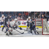 Kamloops Blazers' Shea Van Olm battles Victoria Royals' goaltender Braden Holt