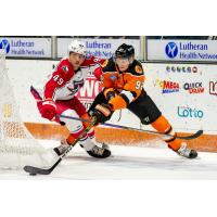 Zach Massicotte of the Allen Americans (left) vs. the Fort Wayne Komets