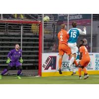 Florida Tropics' Skylar Funk and St. Louis Ambush's Billy Stimac in action