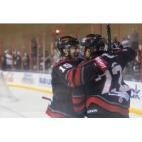 Rapid City Rush's Calder Brooks and Matthew Marcinew celebrate win