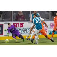 Florida Tropics goalkeeper Chris Frederick makes a diving save attempt