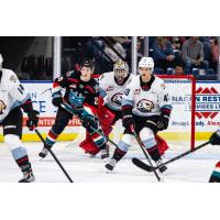 Kelowna Rockets right wing Andrew Cristall (left) vs. the Portland Winterhawks