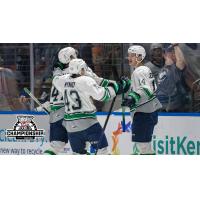 Seattle Thunderbirds' Sawyer Mynio, Lucas Ciona and Kevin Korchinski celebrate win