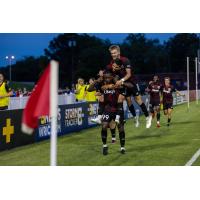 Richmond Kickers' Kharlton Belmar celebrates win