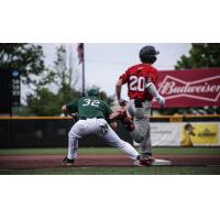 Mankato MoonDogs first baseman Noah Hull takes a throw