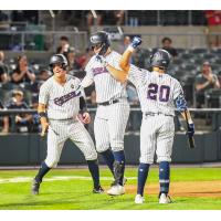 Somerset Patriots celebrate Tyler Hardman's grand slam