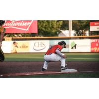 Mankato MoonDogs first baseman Kip Fougerousse takes a throw