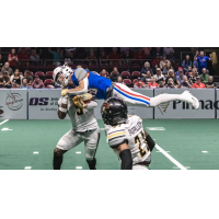 Northern Arizona Wranglers fly in to make a tackle against the Tucson Sugar Skulls