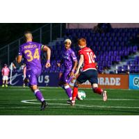 Pacific FC's Manuel Aparicio and Atlético Ottawa's Oliver Jacob Bassett on the field