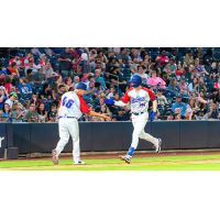 Tulsa Drillers' manager Scott Hennessey congratulates Kody Hoese