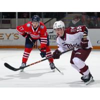 Peterborough Petes right wing Francis Parish (right) vs. the Oshawa Generals