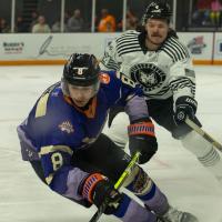 Knoxville Ice Bears' Kevin Lassman and Fayetteville Marksmen's Austen Long on game night